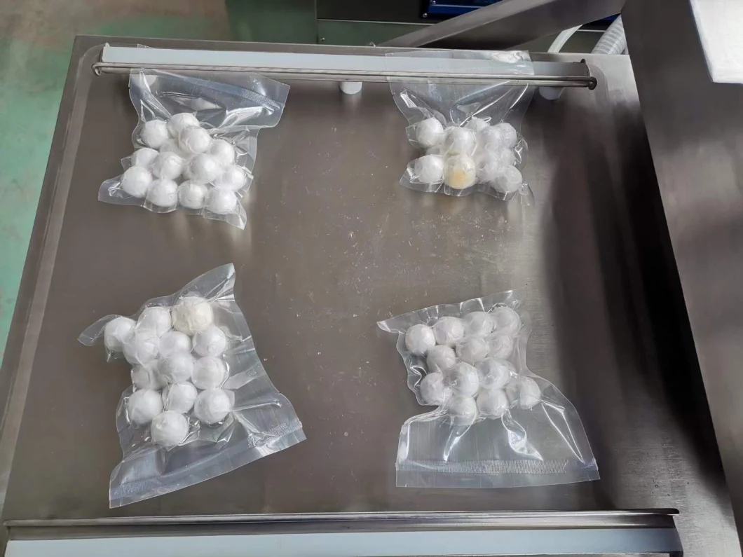 Automatic Rolling Vacuum Packaging Machine for Packing Meat Chicken and Other Food Products